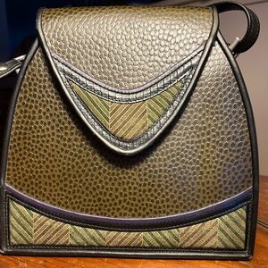 Roche handmade leather bag.